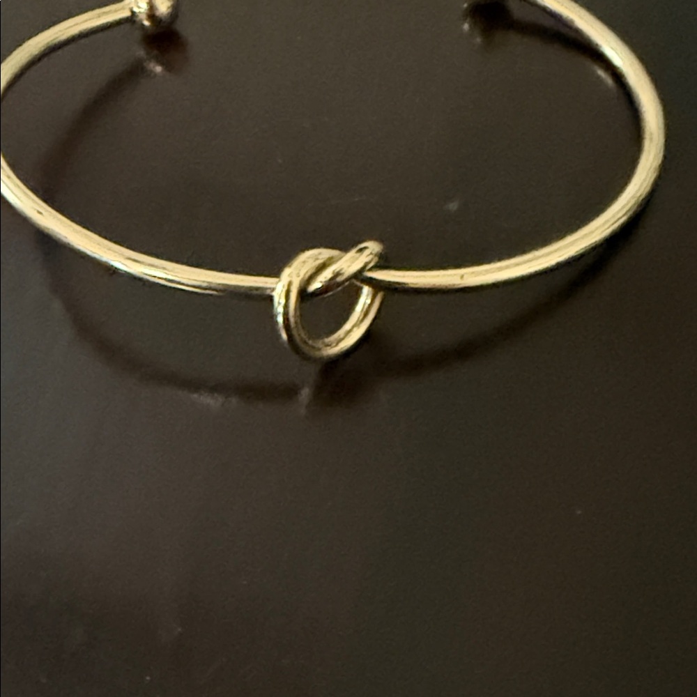Elegant Gold Knot Cuff Bracelet - Picture 2 of 3